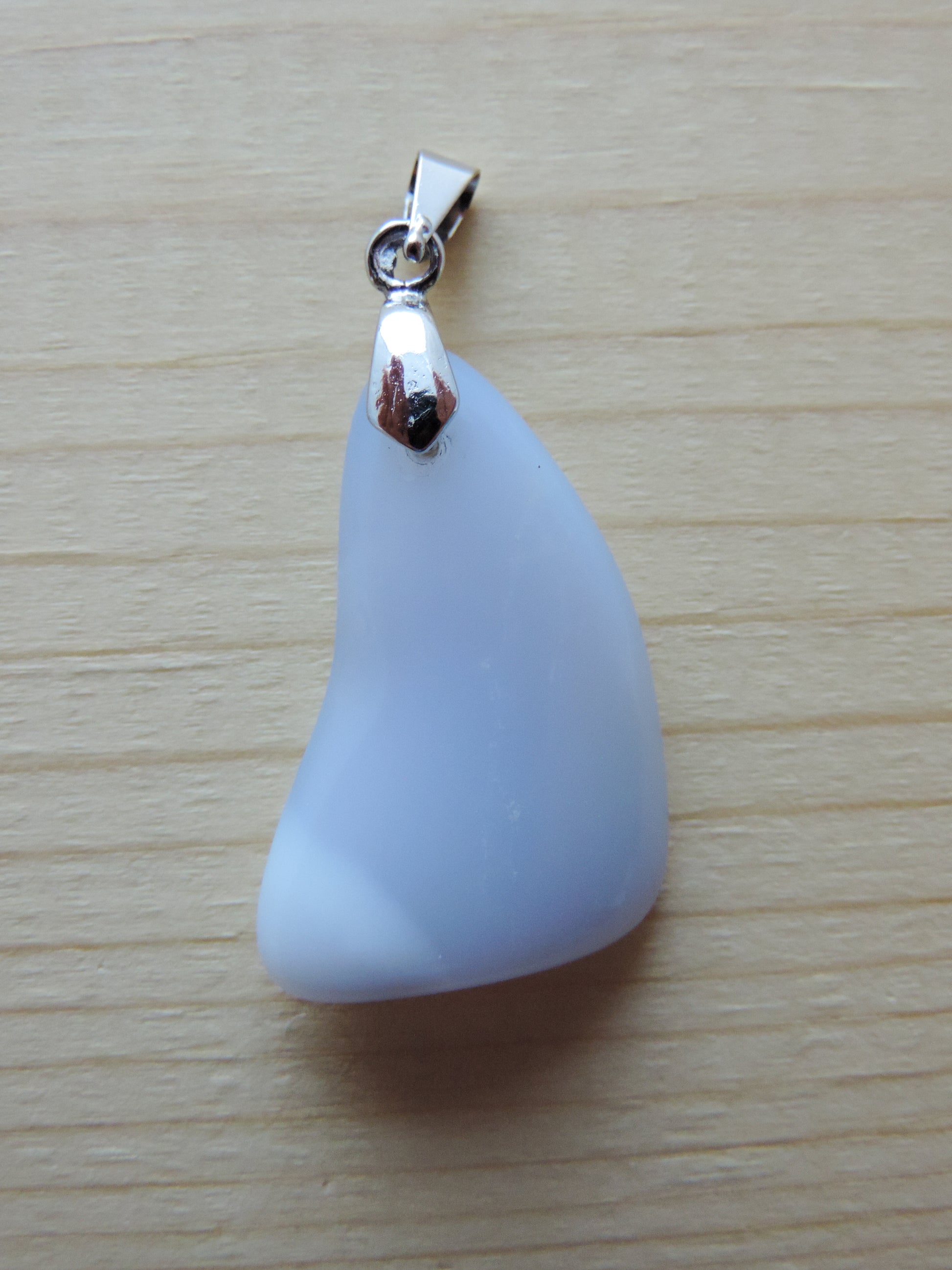 Montana Madison Blue Agate Pendant.  The stone in this pendant is a unique result of tumble shaping and polishing a piece of agate from its natural state.