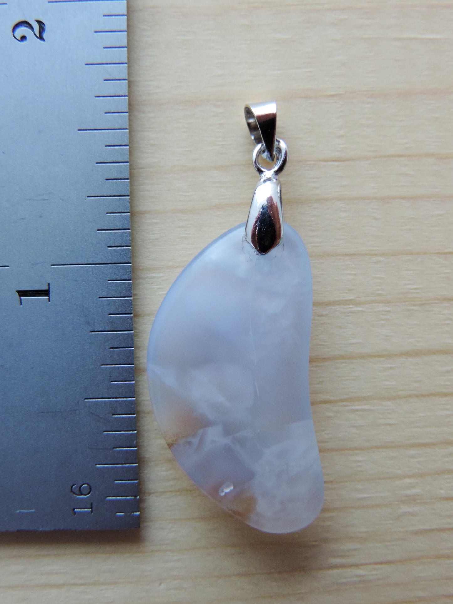 This rare stone is found in only a few locations in Montana, our material is hand collected on private property in the mountains and carried out in backpacks...each piece worth its weight in every step! The translucent blue agate and its color variations have an alluring effect, many people find the blue agate a relaxing, calming and peaceful stone to wear. Original and unique in design, each piece is hand crafted by lapidary artists in Montana.