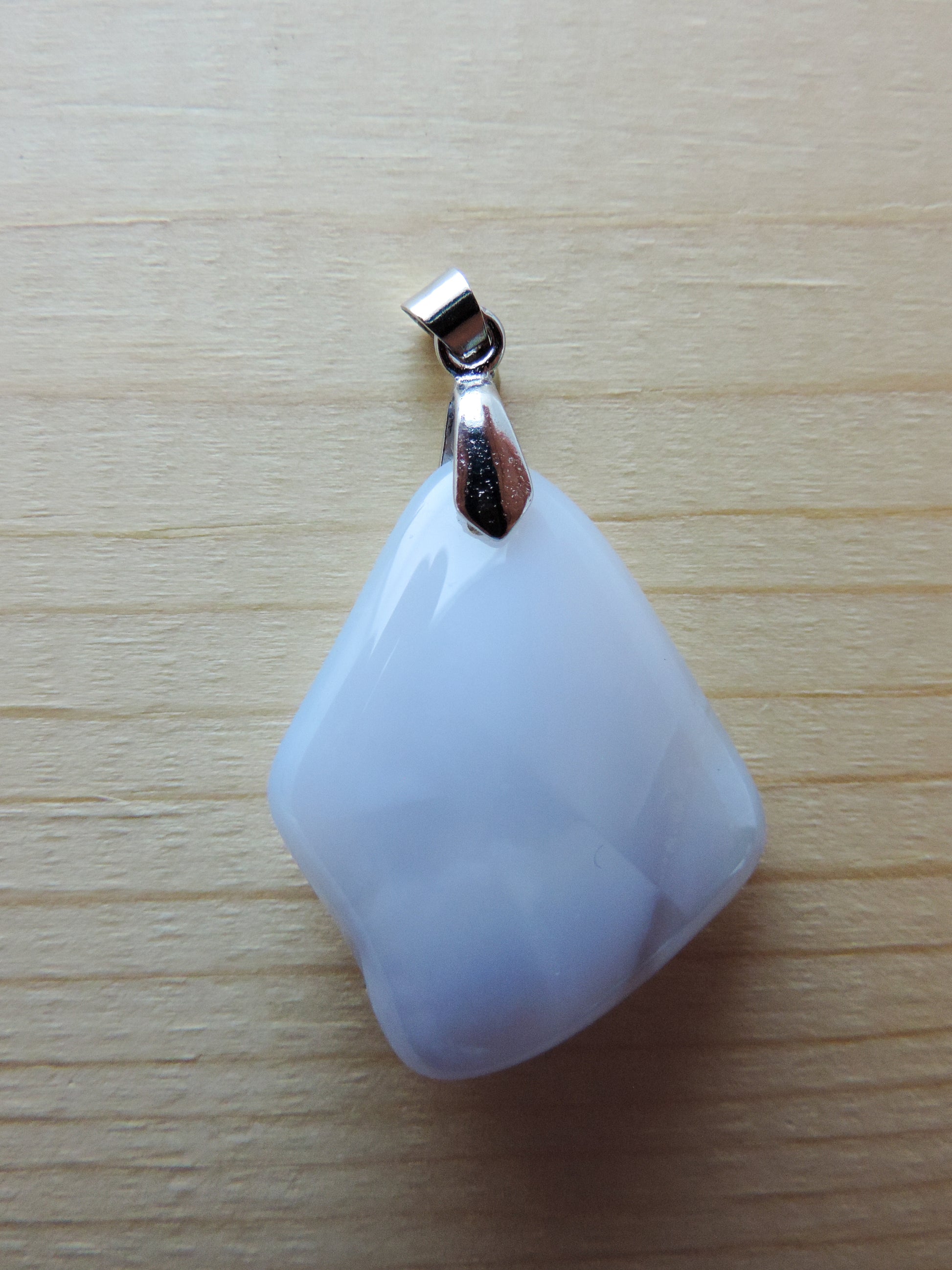 This rare stone is found in only a few locations in Montana, our material is hand collected on private property in the mountains and carried out in backpacks...each piece worth its weight in every step!  The translucent blue agate and its color variations have an alluring effect, many people find the blue agate a relaxing, calming and peaceful stone to wear.  Original and unique in design, each piece is hand crafted by lapidary artists in Montana.