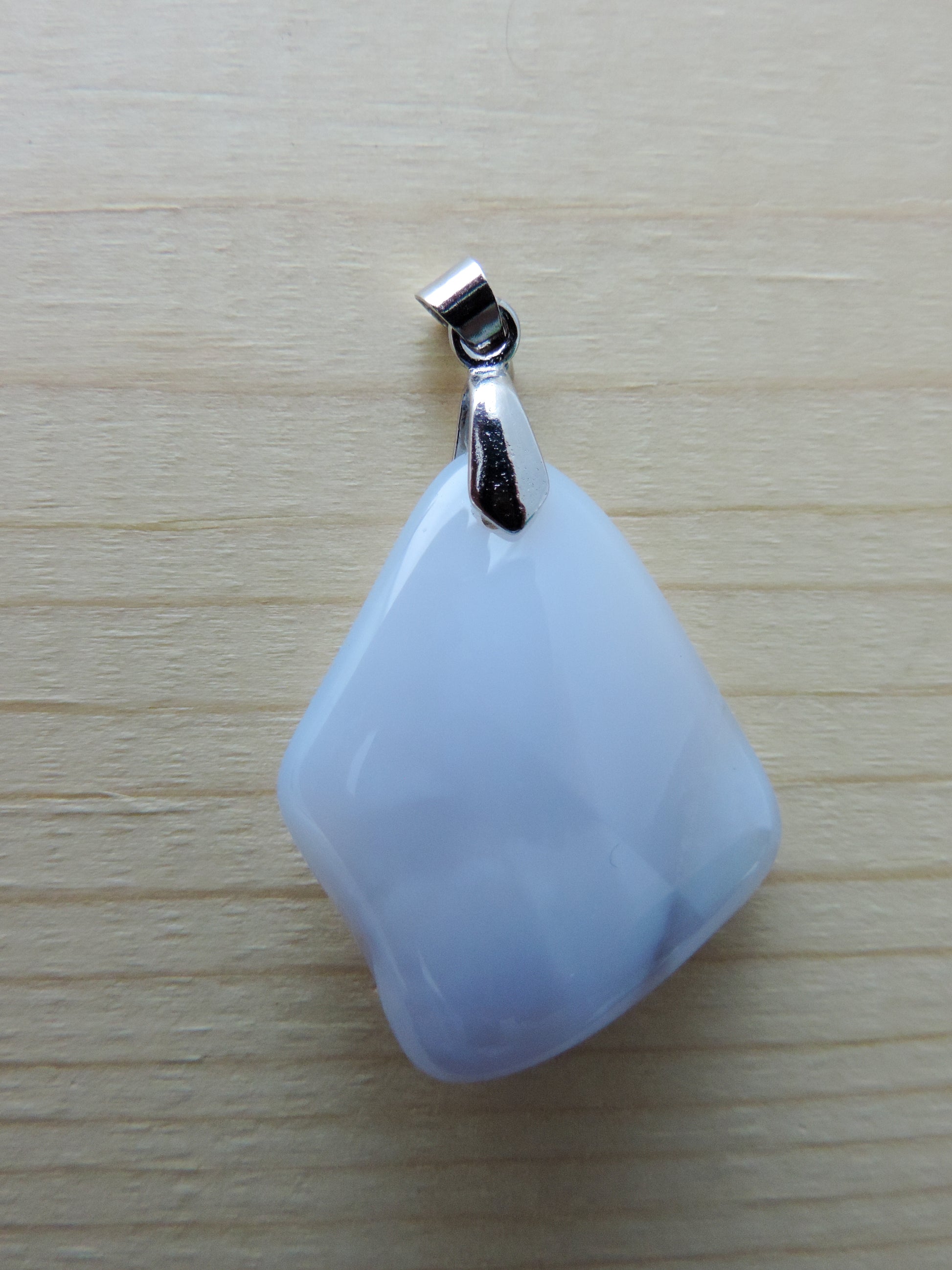 This rare stone is found in only a few locations in Montana, our material is hand collected on private property in the mountains and carried out in backpacks...each piece worth its weight in every step!  The translucent blue agate and its color variations have an alluring effect, many people find the blue agate a relaxing, calming and peaceful stone to wear.  Original and unique in design, each piece is hand crafted by lapidary artists in Montana.