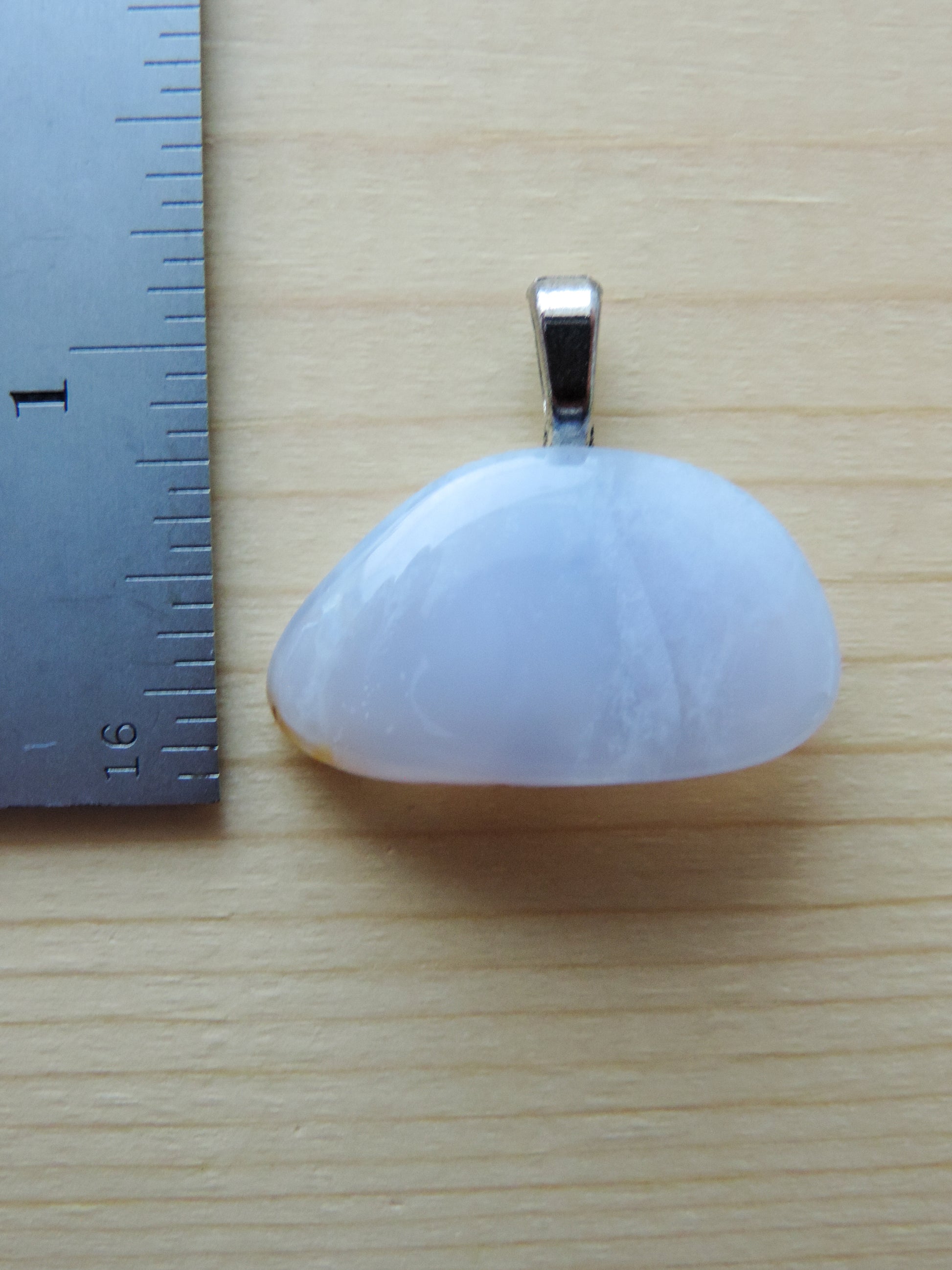 This rare stone is found in only a few locations in Montana, our material is hand collected on private property in the mountains and carried out in backpacks...each piece worth its weight in every step!  The translucent blue agate and its color variations have an alluring effect, many people find the blue agate a relaxing, calming and peaceful stone to wear.  Original and unique in design, each piece is hand crafted by lapidary artists in Montana.