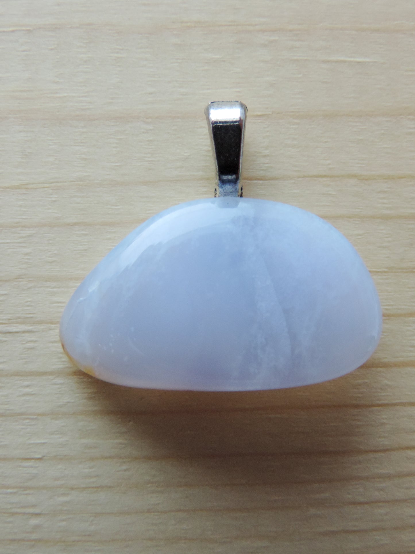 This rare stone is found in only a few locations in Montana, our material is hand collected on private property in the mountains and carried out in backpacks...each piece worth its weight in every step!  The translucent blue agate and its color variations have an alluring effect, many people find the blue agate a relaxing, calming and peaceful stone to wear.  Original and unique in design, each piece is hand crafted by lapidary artists in Montana.