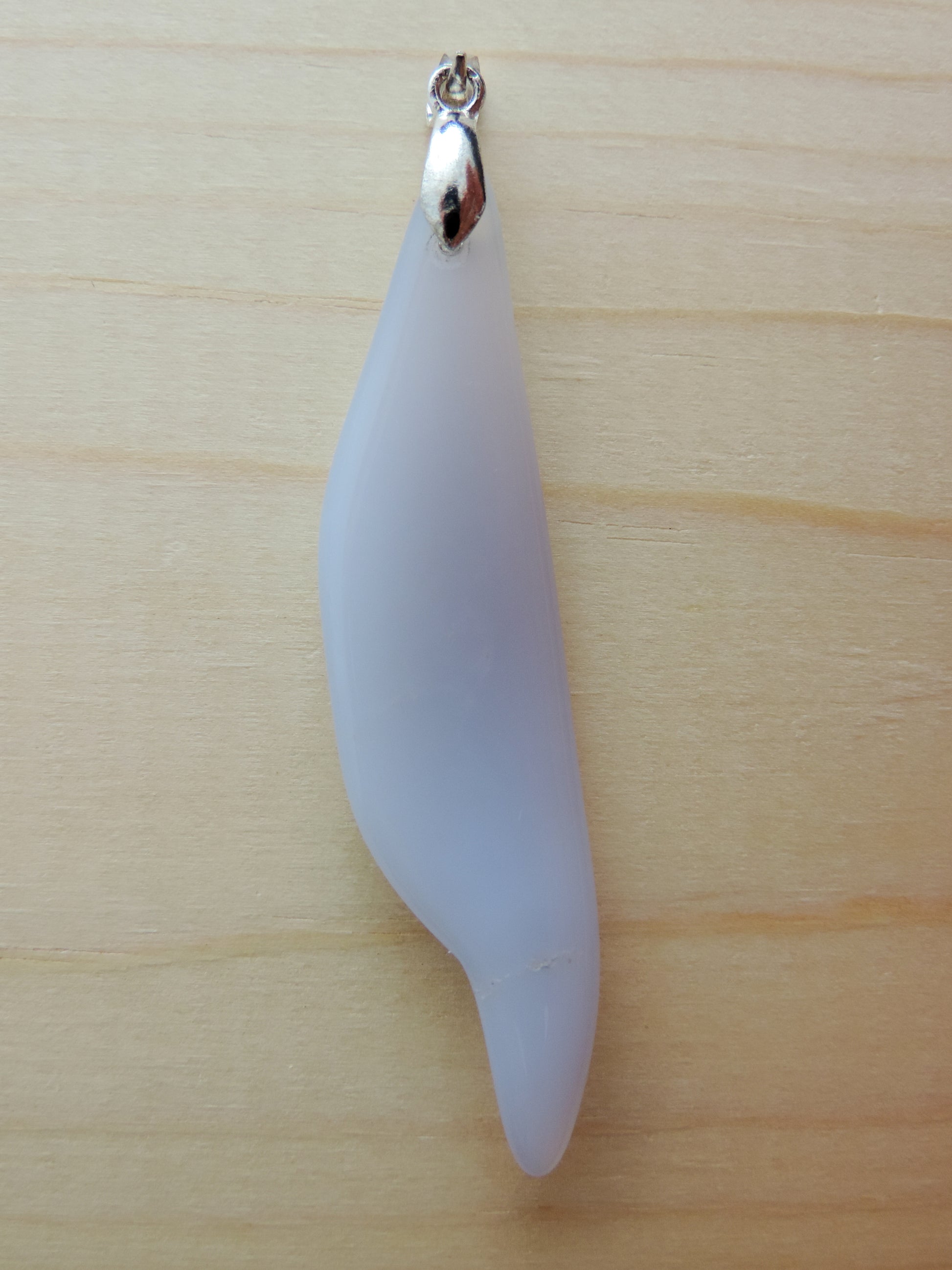 This rare stone is found in only a few locations in Montana, our material is hand collected on private property in the mountains and carried out in backpacks...each piece worth its weight in every step!  The translucent blue agate and its color variations have an alluring effect, many people find the blue agate a relaxing, calming and peaceful stone to wear.  Original and unique in design, each piece is hand crafted by lapidary artists in Montana.