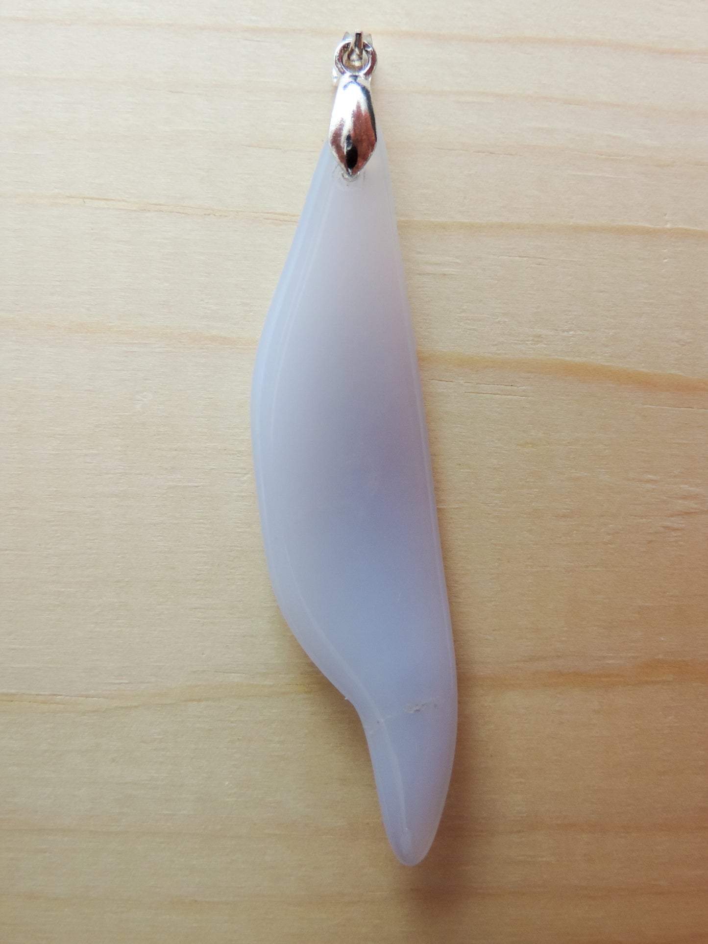 This rare stone is found in only a few locations in Montana, our material is hand collected on private property in the mountains and carried out in backpacks...each piece worth its weight in every step!  The translucent blue agate and its color variations have an alluring effect, many people find the blue agate a relaxing, calming and peaceful stone to wear.  Original and unique in design, each piece is hand crafted by lapidary artists in Montana.