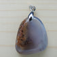 This rare stone is found in only a few locations in Montana, our material is hand collected on private property in the mountains and carried out in backpacks...each piece worth its weight in every step!  The translucent blue agate and its color variations have an alluring effect, many people find the blue agate a relaxing, calming and peaceful stone to wear.  Original and unique in design, each piece is hand crafted by lapidary artists in Montana. 