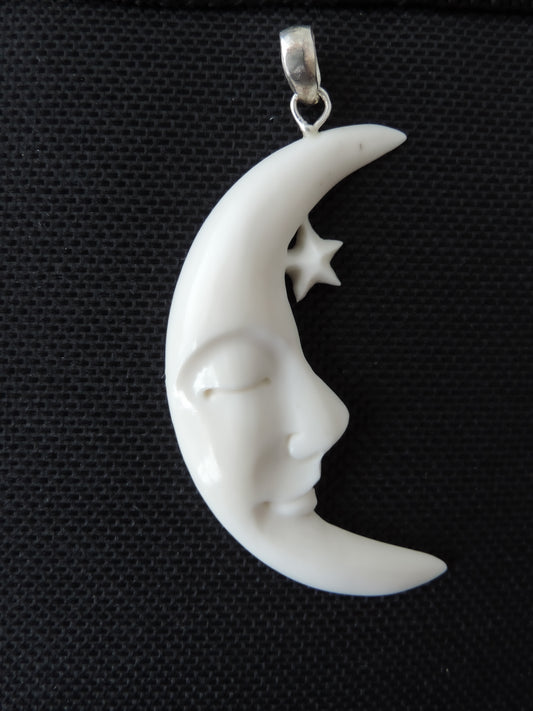 Bone Moon Pendant.  Hand carved from bone by lapidary artists in Indonesia.  ﻿Express your cosmic love when you wear this pendant.