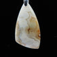 Brown Lace Agate pendant from West Sumatra. Brown Lace Agate from West Sumatra.  Indonesian Agates exhibit a wide variety of colors and amazing complexity.  No two agates are exactly alike, each one being a unique and beautiful creation! The pendant bail is authentic 925 sterling silver.     Our hand crafted jewelry is photographed next to a ruler for size.  This stone is a natural color, no dyes or heat treatment have been used. 