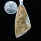 Our hand crafted jewelry pendant is photographed next to a ruler for size.  This stone is a natural color, no dyes or heat treatment have been used. 
