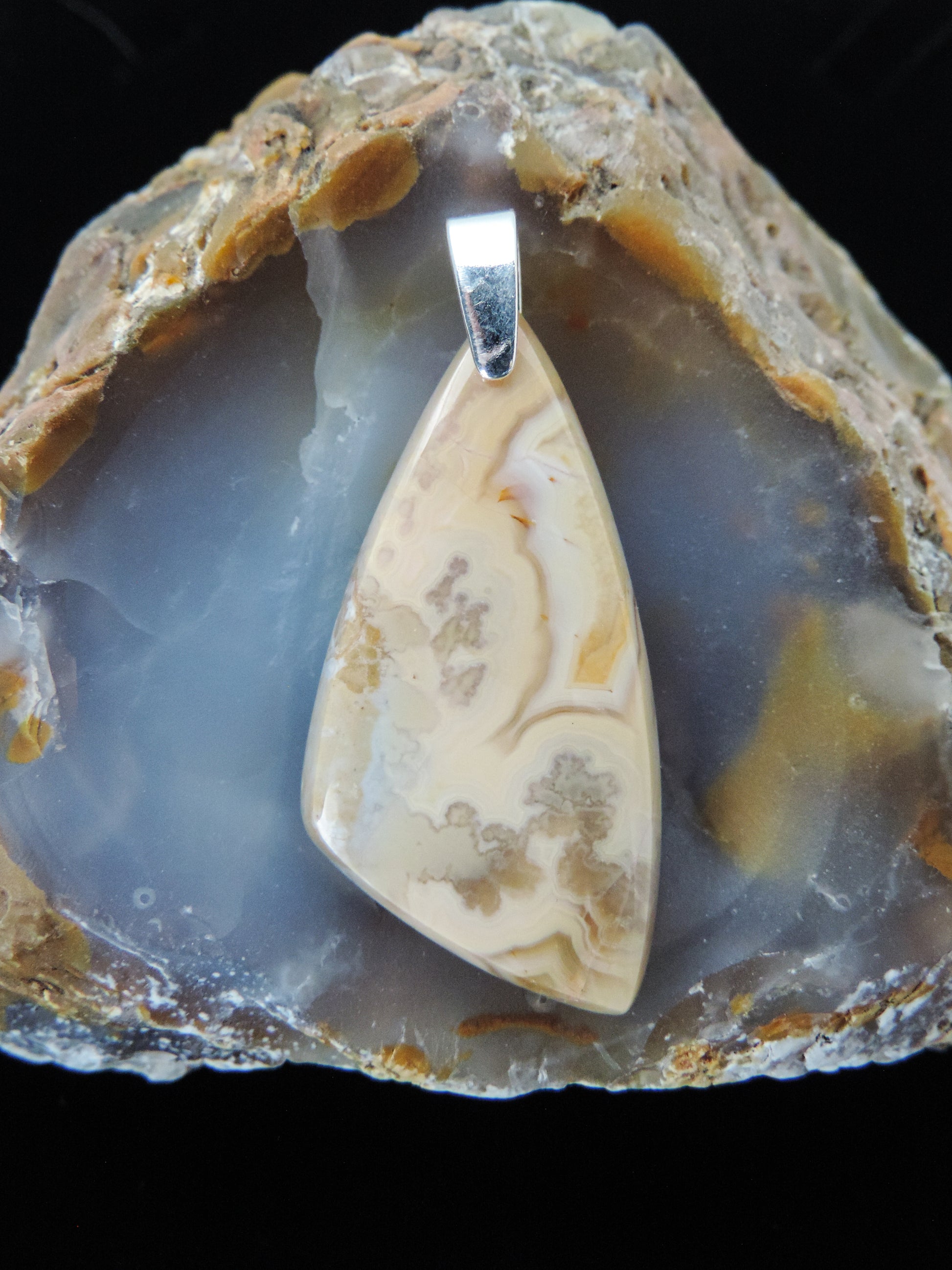 Find your perfect Indonesian Agate pendant jewelry on our store!  The pendant bail is authentic 925 sterling silver.