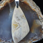 Find your perfect Indonesian Agate pendant on our store!  The pendant bail is authentic 925 sterling silver.   Our hand crafted jewelry pendant is photographed next to a ruler for size