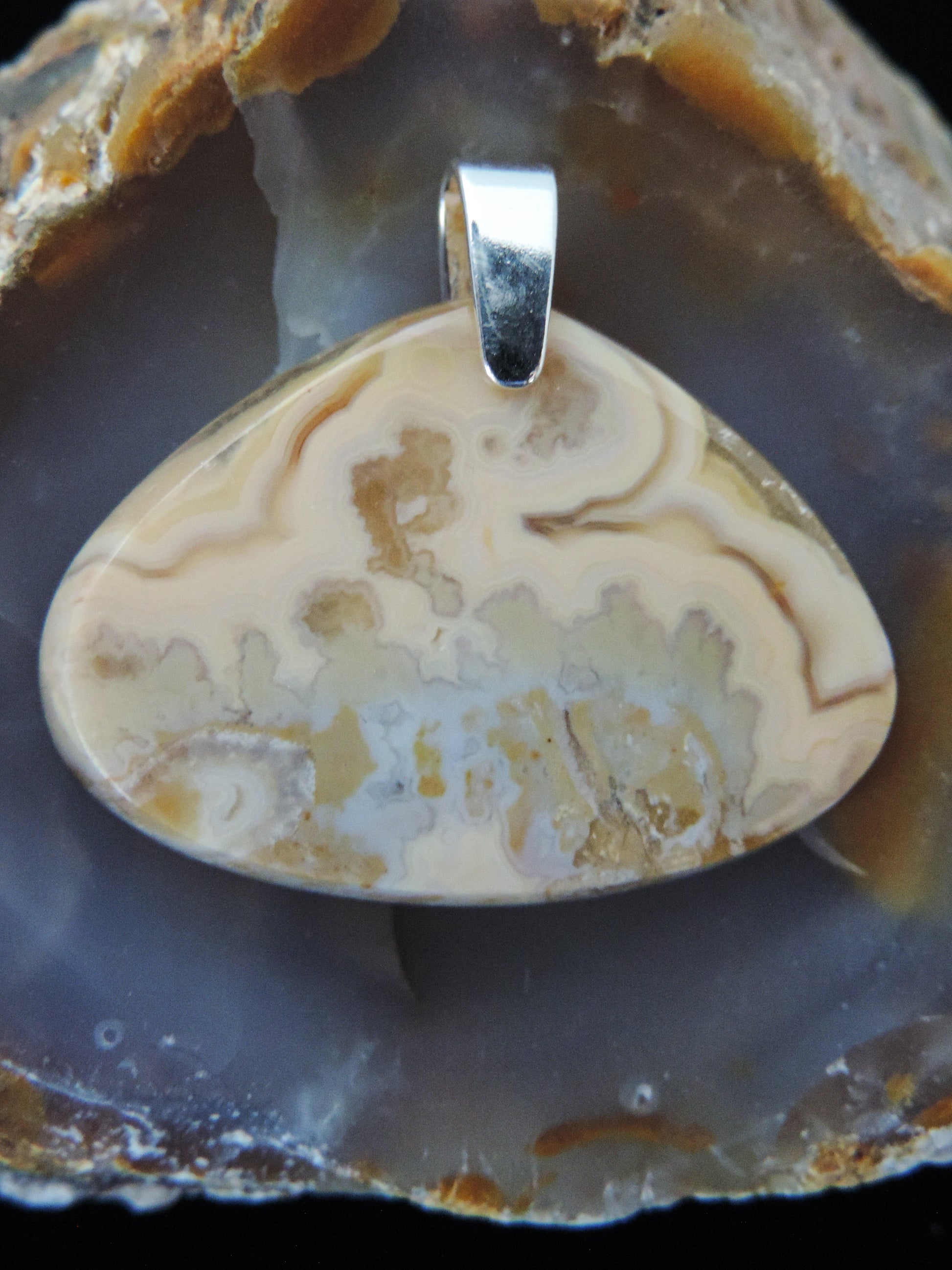 Brown Lace Agate pendant from West Sumatra.  Indonesian Agates exhibit a wide variety of colors and amazing complexity.  No two agates are exactly alike, each one being a unique and beautiful creation!  