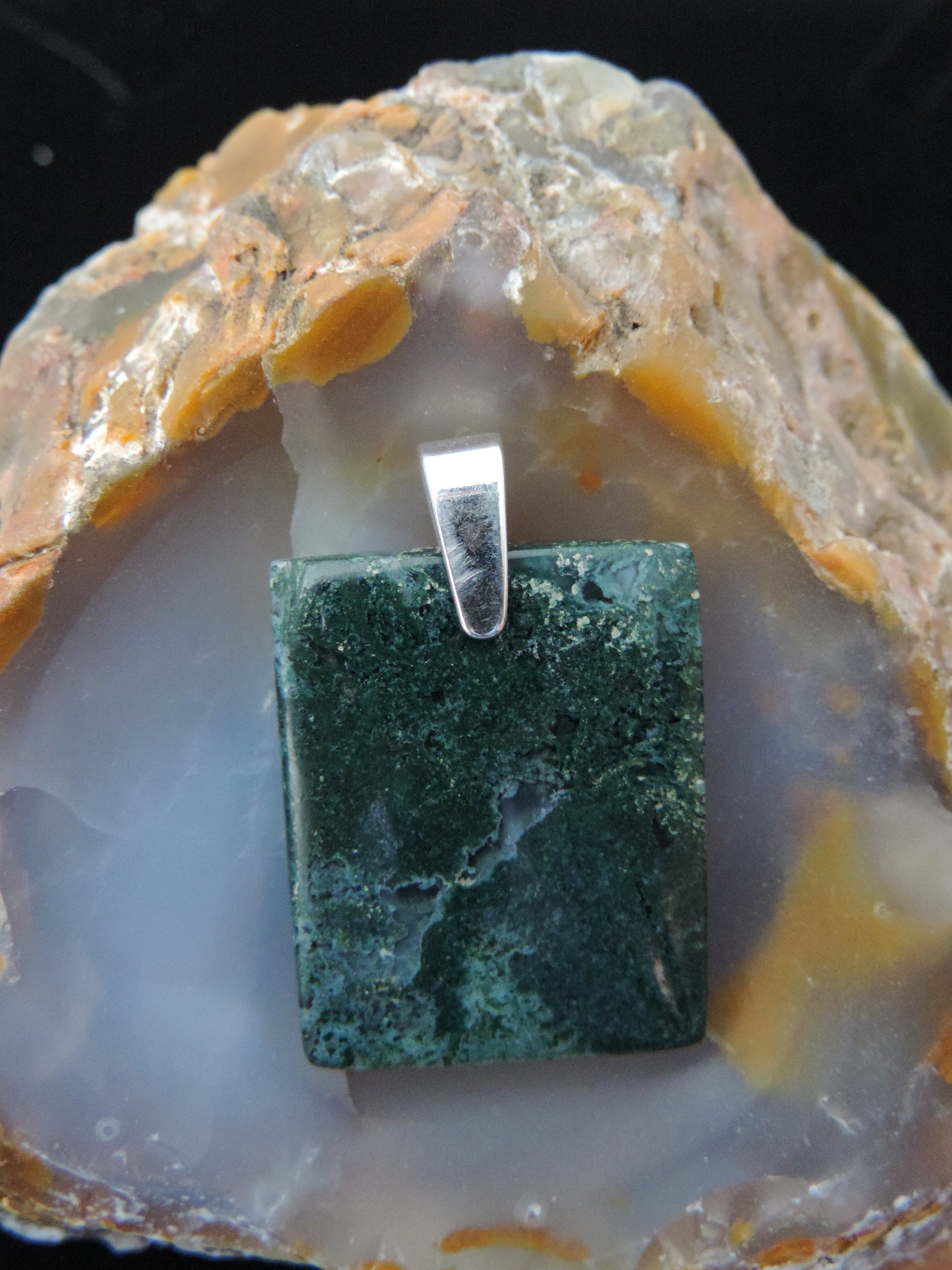 Green Moss Agate pendant from West Java.  Indonesian Green Moss Agate Pendants exhibit a wide variety of colors and amazing complexity.