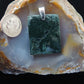 Our hand crafted jewelry pendant is photographed next to a ruler for size.  This stone is a natural color, no dyes or heat treatment have been used. 
