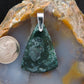 Our hand crafted jewelry pendant is photographed next to a ruler for size.  This stone is a natural color, no dyes or heat treatment have been used. 