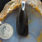 Our hand crafted jewelry pendant is photographed next to a ruler for size.  This stone is a natural color, no dyes or heat treatment have been used.