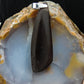 Agni Manitite and Sterling Silver Pendant.  The Agni Manitite pendants on our store are unique in design.  One side is smooth and polished while the other side looks rough and irregular, a representation of its natural state.  