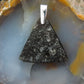 Agni Manitite and Sterling Silver Pendant.  The Agni Manitite pendants on our store are unique in design.  One side is smooth and polished while the other side looks rough and irregular, a representation of its natural state.  