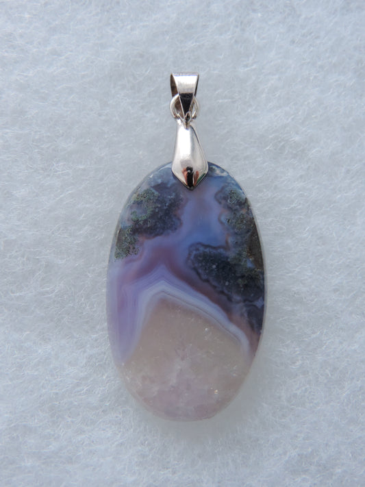 Purple Moss Agate Pendant.  Purple gemstones hold significant and powerful spiritual qualities.  Purple has been associated with wealth, passion, ambition, magic, awareness, mystery, tranquility, inspiration, understanding, calmness and wisdom to name a few. 