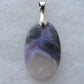 Wear some purple today!  Our hand crafted pendant is photographed next to a ruler for size.