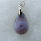 Wear a purple moss agate pendant today!  Our hand crafted jewelry pendant is photographed next to a ruler for size.  This stone is a natural color, no dyes or heat treatment have been used.