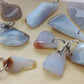 Montana Madison Blue Agate Key Chains.  The stones in these key chains are a result of tumble shaping and polishing a piece of agate from its natural state.