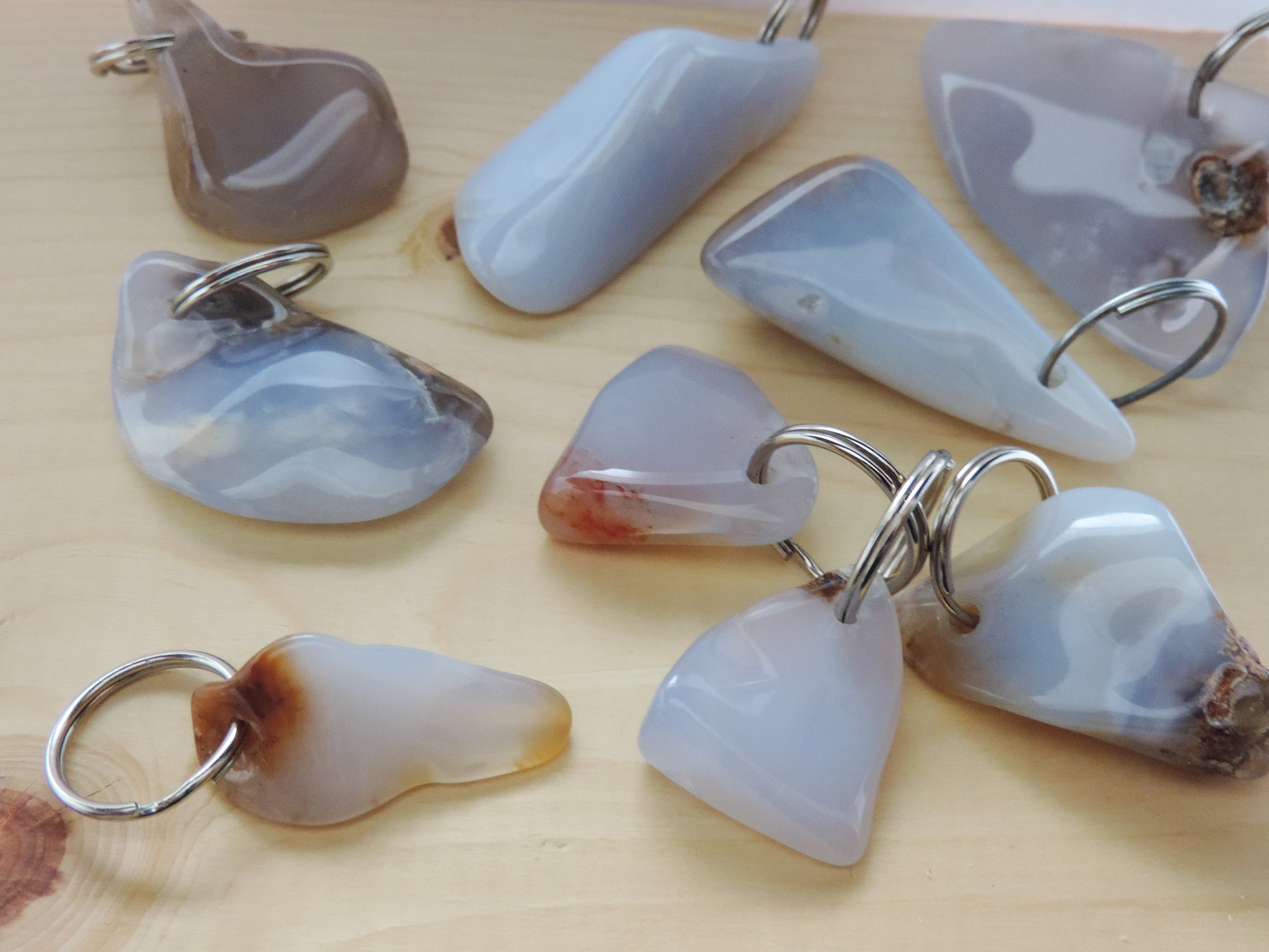 Montana Madison Blue Agate Key Chains.  The stones in these key chains are a result of tumble shaping and polishing a piece of agate from its natural state.