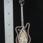 One of a kind Indonesian Fossil Coral & Mixed Metal Guitar Pendant that will be the envy of all your friends!  Our hand crafted jewelry pendant is photographed next to a ruler for size.  This stone is a natural color, no dyes or heat treatment have been used.  