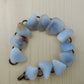 The stones in this bracelet are a unique result of tumble shaping and polishing agate from its natural state.  This one of kind bracelet will show off your unique taste!  Known as the Treasure State, Montana’s landscape is an abundant resource for precious and semi-precious stones.  One of the semi-precious stones, Madison Blue Agate, is featured in this bracelet.  This rare stone is found in only a few locations in Montana