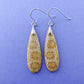 Indonesian Fossilized Coral Earrings & Sterling Silver  Agatized fossil corals are found in several provinces across the Indonesian Islands of Sumatra and Java.  The fossil corals are remnants of ancient reefs thrust up onto the land mass by plate collisions, and later found buried in the soils. 