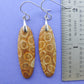 Choose your favorite fossil coral earrings and you’ll be wearing a wonder of the ocean!  Our hand crafted jewelry earrings are photographed next to a ruler for size.  This stone is a natural color, no dyes or heat treatment have been used.  It was photographed without filters on automatic setting in natural light;