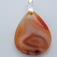 Timor Agate & Sterling Silver Pendant.  Timor Agate from Sumatra.  Indonesian Agates exhibit a wide variety of colors and amazing complexity.  No two agates are exactly alike, each one being a unique and beautiful creation!  