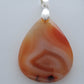 Find your perfect Indonesian Agate Pendant on our store!   Our hand crafted pendant is photographed next to a ruler for size.  This stone is a natural color, no dyes or heat treatment have been used. 