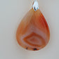 Find your perfect Indonesian Agate Pendant on our store!   Our hand crafted pendant is photographed next to a ruler for size.  This stone is a natural color, no dyes or heat treatment have been used.  