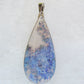Moss Agate Pendant.  Indonesian Agates exhibit a wide variety of colors and amazing complexity.  No two agates are exactly alike, each one being a unique and beautiful creation!  Agates with multiple bands of color are known as fortification agates, those with dendritic or moss looking inclusions are referred to as moss agate and many others are given descriptive names relative to their appearance or where they are found. 