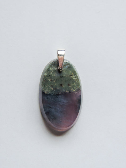 Purple Moss Agate & Sterling Silver Pendant.  Purple gemstones hold significant and powerful spiritual qualities.  Purple has been associated with wealth, passion, ambition, magic, awareness, mystery, tranquility, inspiration, understanding, calmness and wisdom to name a few. 