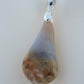 This rare stone is found in only a few locations in Montana, our material is hand collected on private property in the mountains and carried out in backpacks...each piece worth its weight in every step!  The translucent blue agate and its color variations have an alluring effect, many people find the blue agate a relaxing, calming and peaceful stone to wear.  Original and unique in design, each piece is hand crafted by lapidary artists in Montana. 