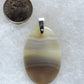 Find your perfect Indonesian Agate on our store!  The pendant bail is authentic 925 sterling silver. 