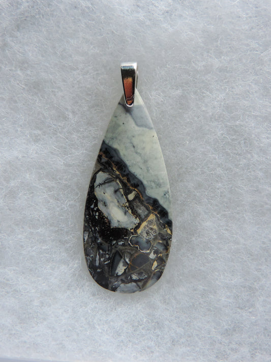 Exquisite in appearance, this Maligano Jasper & Sterling Silver Pendant will compliment your formal or casual attire.   The pendant bail is authentic 925 sterling silver. 