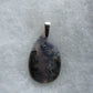 Wear a Purple Moss Agate Pendant today and feel the difference!!  The pendant bail is authentic 925 sterling silver.  Our hand crafted jewelry is photographed next to a ruler for size.  This stone is a natural color, no dyes or heat treatment have been used.  It was photographed without filters on automatic setting in natural light; however, slight color variations may occur due to digitization.  