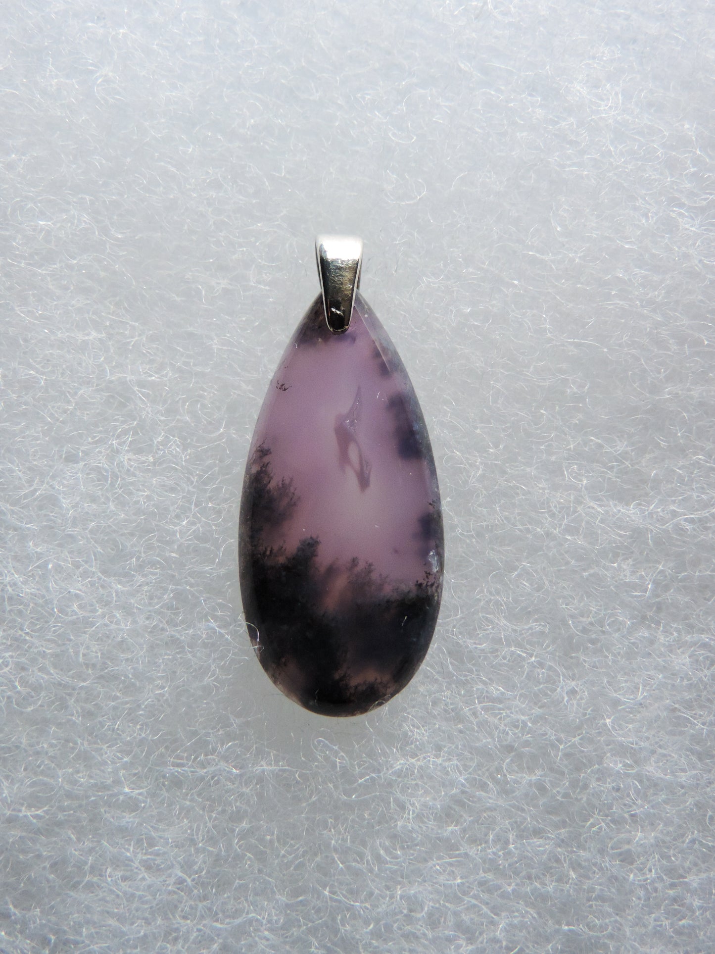 Purple Moss Agate & Sterling Silver Pendant.  Purple gemstones hold significant and powerful spiritual qualities.  Purple has been associated with wealth, passion, ambition, magic, awareness, mystery, tranquility, inspiration, understanding, calmness and wisdom to name a few.  Throughout 