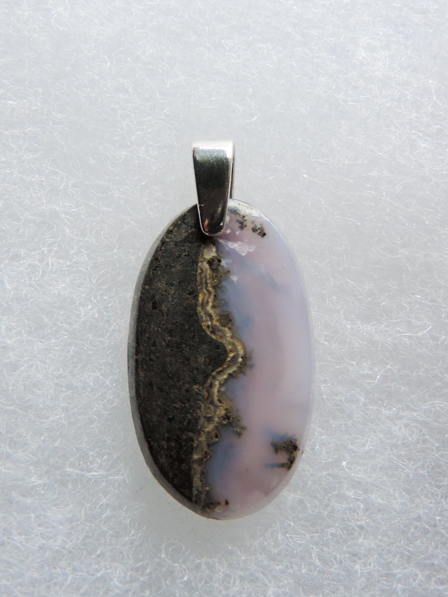 Purple Moss Agate & Sterling Silver Pendant.  Purple gemstones hold significant and powerful spiritual qualities.  Purple has been associated with wealth, passion, ambition, magic, awareness, mystery, tranquility, inspiration, understanding, calmness and wisdom to name a few. 