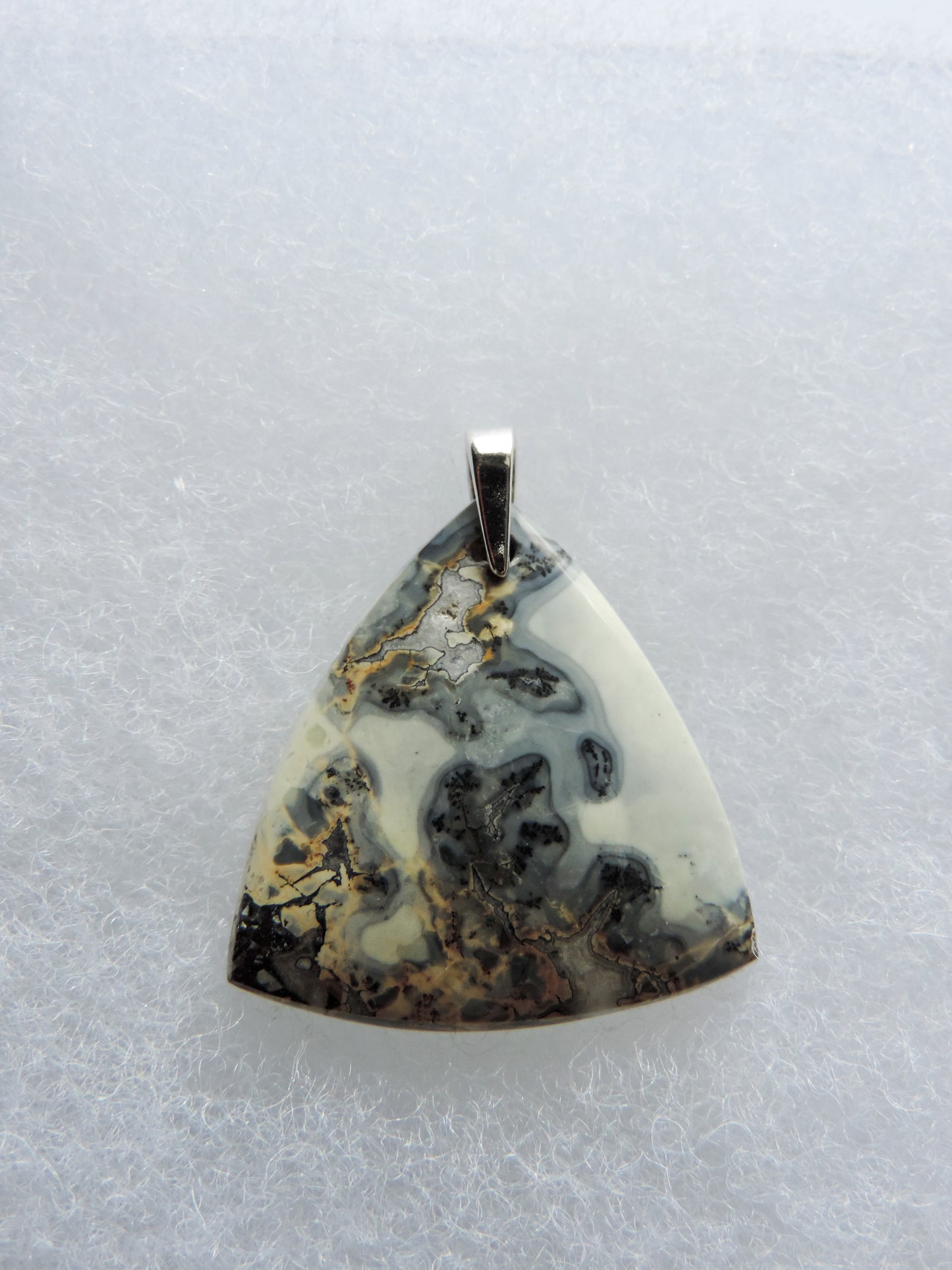 Exquisite in appearance, this Maligano Jasper & Sterling Silver Pendant will compliment your formal or casual attire.   The pendant bail is authentic 925 sterling silver.