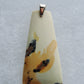 Exquisite in appearance, this Maligano Jasper & Sterling Silver Pendant will compliment your formal or casual attire.   The pendant bail is authentic 925 sterling silver.