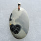 Maligano Jasper & Sterling Silver Pendant.  Maligano Jasper is a specific type of jasper found in Indonesia and forms in ancient volcanic hot springs areas.  It’s named after a small village in Sulawesi, Indonesia and is mined by hand as the village doesn’t have the heavy machinery required for deep excavation mining techniques.  Found roughly ten years ago, this stone has made its way into the main stream market.