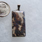 Find your perfect Indonesian Moss Agate on our store!   Our hand crafted jewelry pendant is photographed next to an item for size comparison