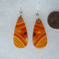 Carnelian Agate & Sterling Silver Earrings  Indonesian Agates exhibit a wide variety of colors and amazing complexity.  No two agates are exactly alike, each one being a unique and beautiful creation!  Agates with multiple bands of color are known as fortification agates, those with dendritic or moss looking inclusions are referred to as moss agate and many others are given descriptive names relative to their appearance or where they are found