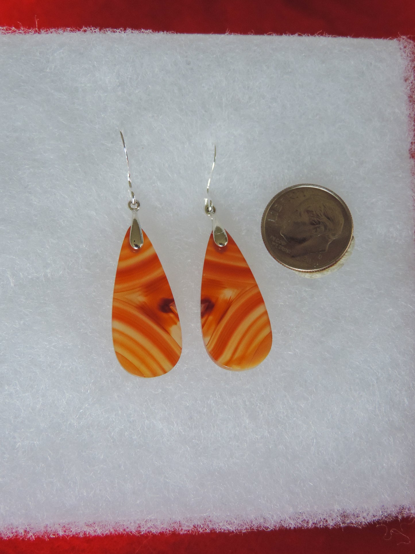 Find your perfect Indonesian Carnelian Agate Earrings on our store today!!  The bail and earring wire are authentic 925 sterling silver   This stone is