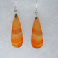 Carnelian Agate & Sterling Silver Earrings.  Indonesian Carnelian Agates exhibit a wide variety of colors and amazing complexity.  No two agates are exactly alike, each one being a unique and beautiful creation!  Agates with multiple bands of color are known as fortification agates, those with dendritic or moss looking inclusions are referred to as moss agate and many others are given descriptive names relative to their appearance or where they are found. 