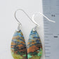 These rich minerals are responsible for the amazing colors in the stone.  The bail and earring wires are authentic 925 sterling silver.  Feel treasured when you wear these beautiful Indonesian Blue Opalized Wood Earrings!