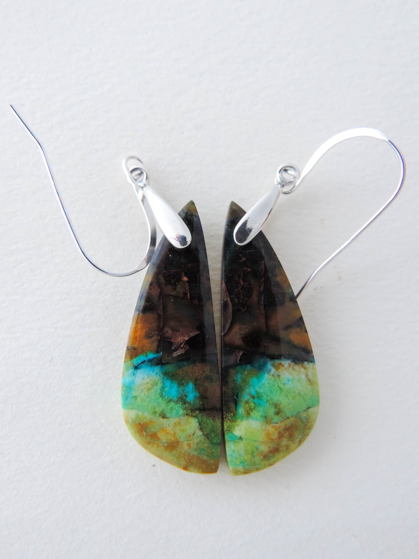 Feel treasured when you wear these Indonesian Blue Opalized Wood Earrings!  Our hand crafted jewelry earrings are photographed next to a ruler for size.  This stone is a natural color, no dyes or heat treatment have been used.